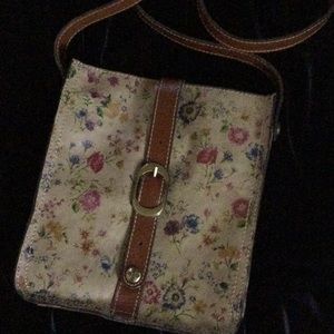 unique Patricia Nash crossbody. Cognac leather accents nice subtle floral print